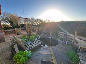 Overview of garden pond, seating area- click for photo gallery